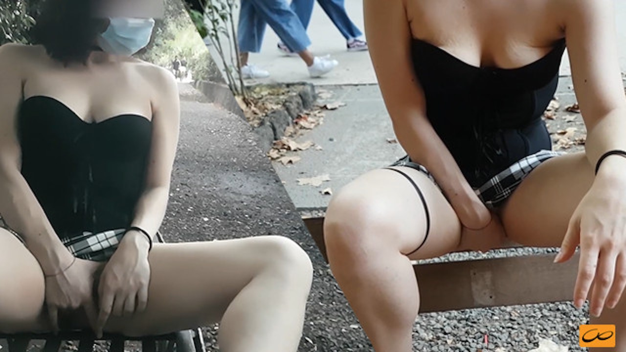 girl masturbates at the park while people walk around