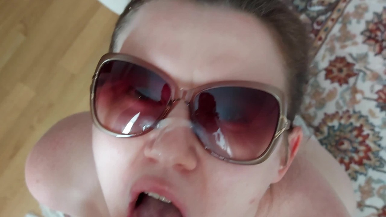 MILF with a hairy red pussy came for a load of cum in her mouth and glasses